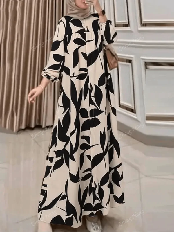 فستان نسائي طويل بأكمام فانوس وطبعة نباتية - تصميم عربي أنيق